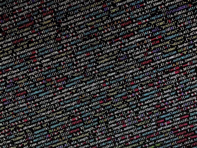 Web development code representing WordPress vs Shopify platform comparison